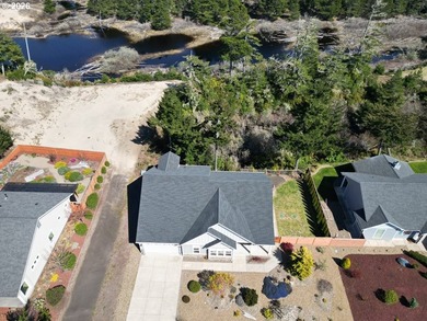 Nestled in the desirable Reserve at Heceta Lake community, this - photo 3