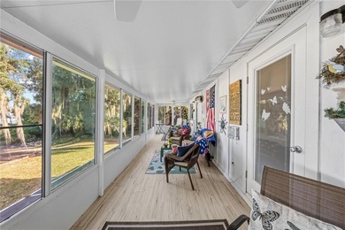 Tucked away on beautiful Lake Weir, this charming gated - photo 44