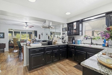 Enjoy stunning golf course and lake views from this exceptional - photo 11