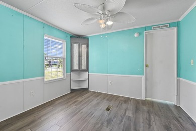 Welcome to the beach! This charming 3-bedroom, 2-bath home - photo 12