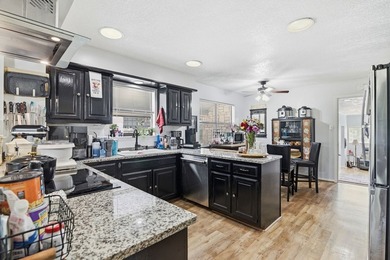Enjoy stunning golf course and lake views from this exceptional - photo 12