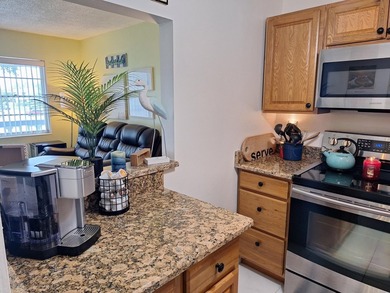 Enjoy peaceful lake views from this charming second-floor pet - photo 13