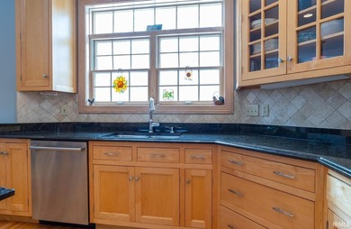 Enjoy the heirloom-quality finishes of this tasteful brick home - photo 14