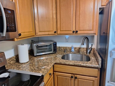 Enjoy peaceful lake views from this charming second-floor pet - photo 16