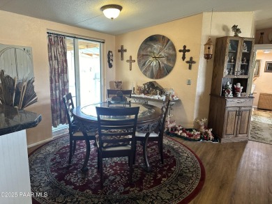 Charming 3-bedroom home on a spacious lot in Mayer! Enjoy the