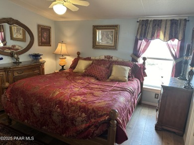 Charming 3-bedroom home on a spacious lot in Mayer! Enjoy the