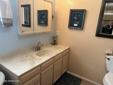 Charming 3-bedroom home on a spacious lot in Mayer! Enjoy the