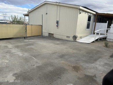 Charming 3-bedroom home on a spacious lot in Mayer! Enjoy the