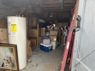 Charming 3-bedroom home on a spacious lot in Mayer! Enjoy the