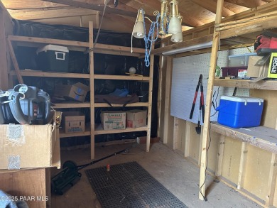 Charming 3-bedroom home on a spacious lot in Mayer! Enjoy the