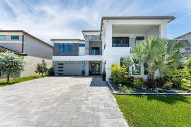 Experience refined South Florida living in this stunning - photo 1