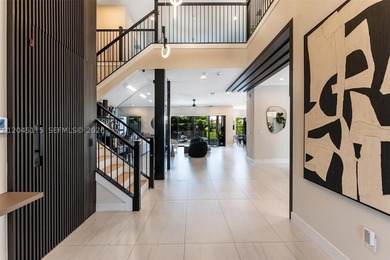 Experience refined South Florida living in this stunning - photo 3