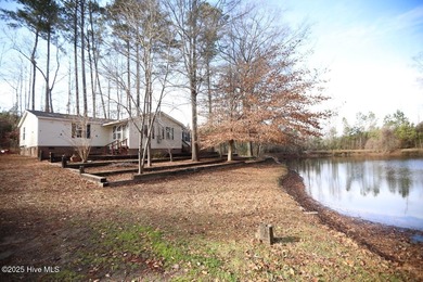 (private lake, pond, coastal) Home Sale Pending in Castalia North Carolina