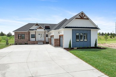 This beautiful custom-built home in The Coves features 3 - photo 2