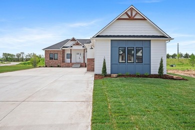 This beautiful custom-built home in The Coves features 3 - photo 4