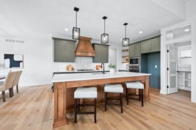This beautiful custom-built home in The Coves features 3 - photo 10