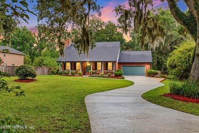Welcome to 5205 River Park Villas Drive, a timeless brick home - photo 1
