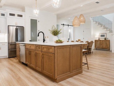 This incredible NEW CONSTRUCTION coastal home is located south - photo 13