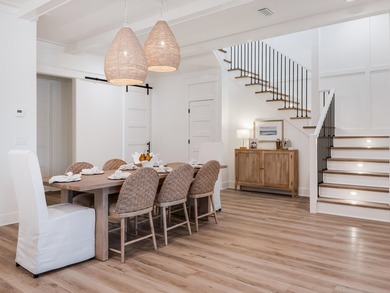 This incredible NEW CONSTRUCTION coastal home is located south - photo 15