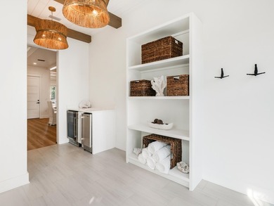 This incredible NEW CONSTRUCTION coastal home is located south - photo 16