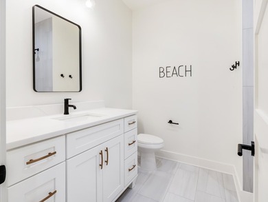 This incredible NEW CONSTRUCTION coastal home is located south - photo 20