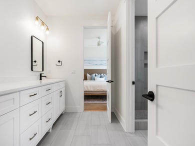 This incredible NEW CONSTRUCTION coastal home is located south - photo 29