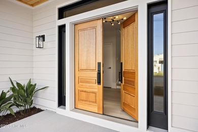 Introducing a stunning new modern coastal retreat in Kure