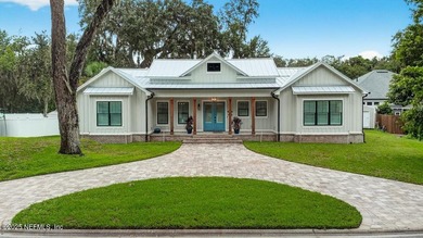 Stunner alert! Welcome to your dream home on the highly - photo 1