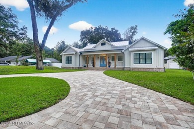 Stunner alert! Welcome to your dream home on the highly - photo 2
