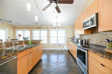 Beautiful one-story home with vaulted ceilings in sought-after