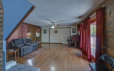 Wake up where the river is the main event. This true log cabin - photo 13
