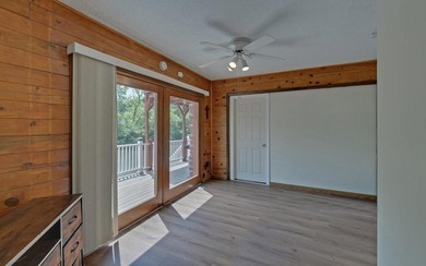 Wake up where the river is the main event. This true log cabin - photo 15