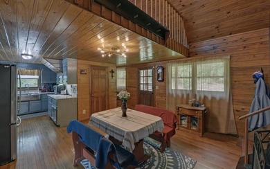 Wake up where the river is the main event. This true log cabin - photo 17