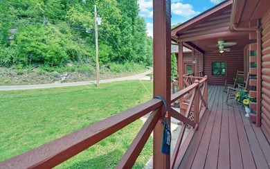 Wake up where the river is the main event. This true log cabin - photo 19