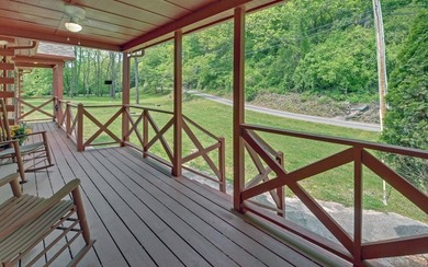 Wake up where the river is the main event. This true log cabin - photo 20