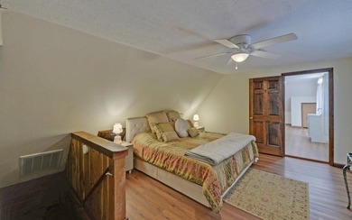 Wake up where the river is the main event. This true log cabin - photo 26