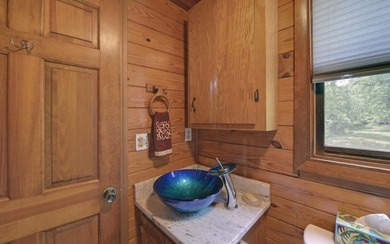 Wake up where the river is the main event. This true log cabin - photo 33