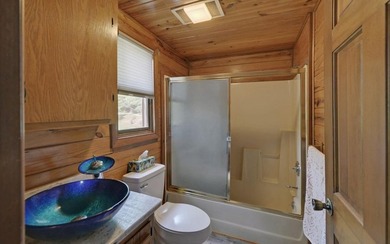 Wake up where the river is the main event. This true log cabin - photo 34