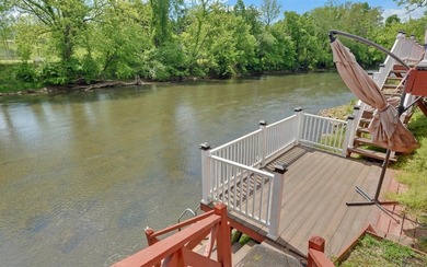 Wake up where the river is the main event. This true log cabin - photo 37