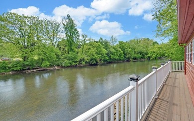 Wake up where the river is the main event. This true log cabin - photo 40