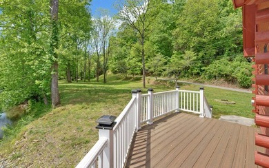 Wake up where the river is the main event. This true log cabin - photo 41