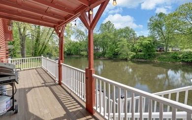 Wake up where the river is the main event. This true log cabin - photo 43