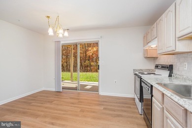 Beautifully updated and move-in ready! This spacious 3-bedroom - photo 8