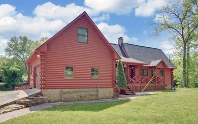 Wake up where the river is the main event. This true log cabin - photo 49