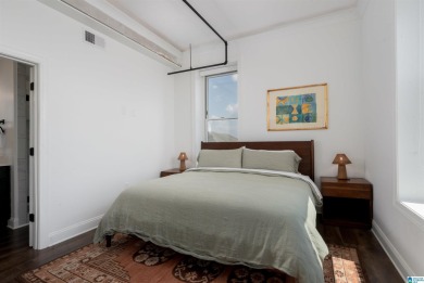 Step into refined downtown living with Unit 600 at The Alston, a