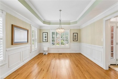 Nestled on a level one-acre lot in the prestigious Island at - photo 5
