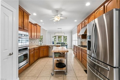 Nestled on a level one-acre lot in the prestigious Island at - photo 7