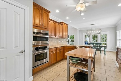 Nestled on a level one-acre lot in the prestigious Island at - photo 8