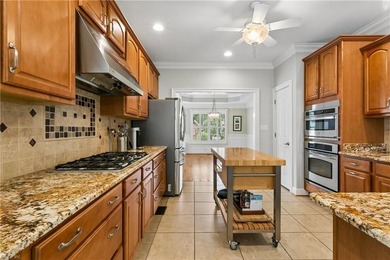 Nestled on a level one-acre lot in the prestigious Island at - photo 9