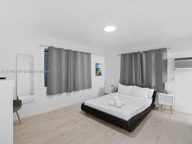 Income-producing 4-unit STR multifamily with prime redevelopment - photo 9